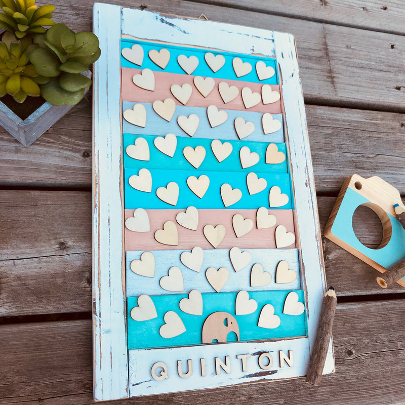 Baby Elephant Guest book Alternative on a Vintage Shutter!   Guest book doesn’t need to be boring, it can turn into an art piece and nursery decor!  We add a touch of colour to a vintage-styled shutter.  We can customize the name and colour combination to match the nursery or any theme colour. Have your guests sign a wooden heart and hang this guestbook as an artwork after the baby shower. Great keepsake gift and surely a conversational starter!