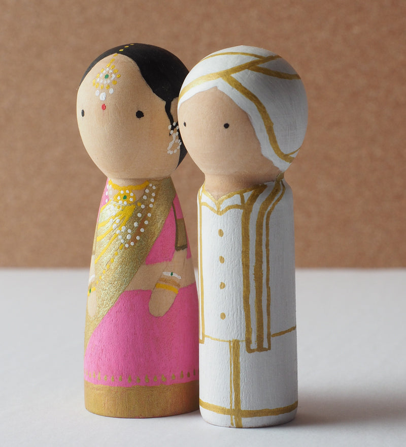 Customized wedding cake topper!  These cute peg dolls show the unique sides of you and your partner.  A great touch of personality to your wedding.  They will WOW your guests.  Also, what a great keepsake it would be!  These are also great for anniversary gifts, couples’ gifts, bridal showers, or any other occasions.