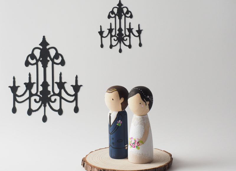 Customized wedding cake topper!  These cute peg dolls show the unique sides of you and your partner.  A great touch of personality to your wedding.  They will WOW your guests.  Also, what a great keepsake it would be!