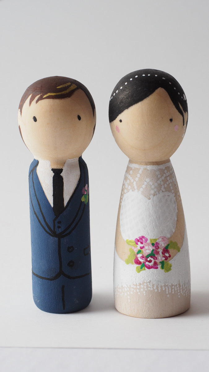 Customized wedding cake topper!  These cute peg dolls show the unique sides of you and your partner.  A great touch of personality to your wedding.  They will WOW your guests.  Also, what a great keepsake it would be!
