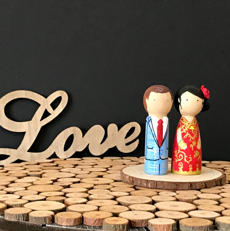 Chinese Wedding Peg Dolls.  Customized wedding cake topper!  These cute peg dolls show the unique sides of you and your partner.  A great touch of personality to your wedding.  They will WOW your guests.  Also, what a great keepsake it would be!  These are also great for anniversary gifts, couples’ gifts, bridal showers, or any other occasions.  We hand-paint the peg dolls to match your wedding attires and culture. 