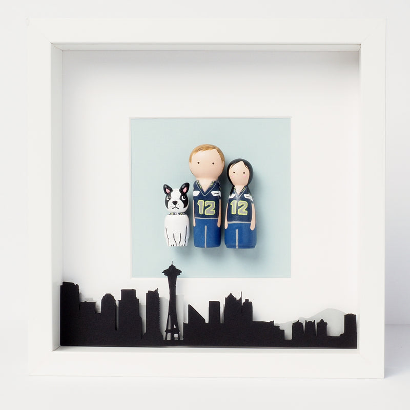 Give something unique and personalized. Custom peg dolls of your family! They are hand-painted that show the uniqueness of each individual in your family. A 9"x9" white shadow frame is included with the city landscape of your hometown! This will definitely touch the heart and bring smiles, may be even happy tears of your loved ones.  These are great for parents, grandparent’s gifts, birthdays, anniversary gifts, couples’ gifts, or any other occasions.