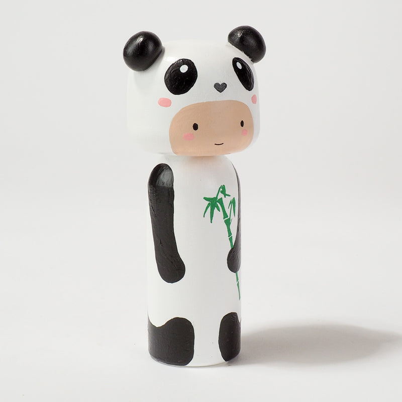 Kokeshi doll in Panda costume!  This cute panda doll will warm your heart or your special someone.  Perfect gift for anyone who are in love with panda!   All dolls are hand-painted with love.  Collect them all, other animals are also available.