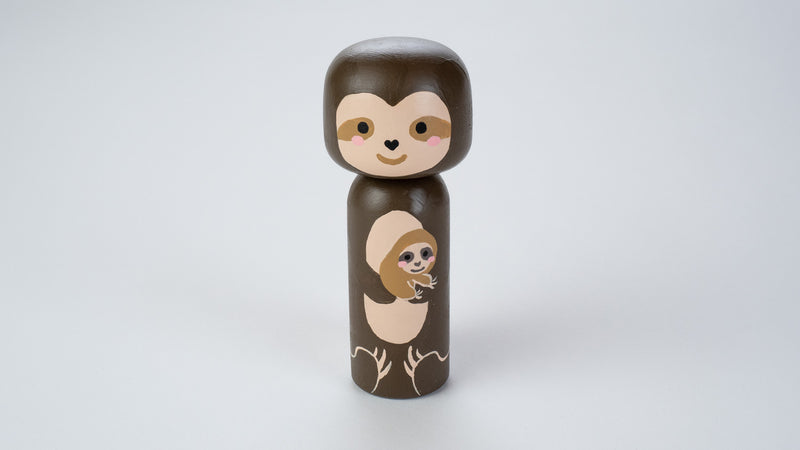 Sample Sale!  These sample Kokeshi dolls are as-is.  Sloth and baby Sloth Kokeshi doll!  This cute sloth wooden doll will warm your heart or your special someone.  Perfect gift for anyone who are in love with sloth!    All dolls are hand-painted with love.  Collect them all, other animals are also available.  This listing include 1 sloth Kokeshi doll.  The large doll is approximately 5.7” tall x 2.4” wide, which is doubled in size of our regular peg dolls. 