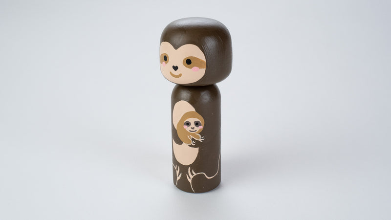 Sample Sale!  These sample Kokeshi dolls are as-is.  Sloth and baby Sloth Kokeshi doll!  This cute sloth wooden doll will warm your heart or your special someone.  Perfect gift for anyone who are in love with sloth!    All dolls are hand-painted with love.  Collect them all, other animals are also available.  This listing include 1 sloth Kokeshi doll.  The large doll is approximately 5.7” tall x 2.4” wide, which is doubled in size of our regular peg dolls. 