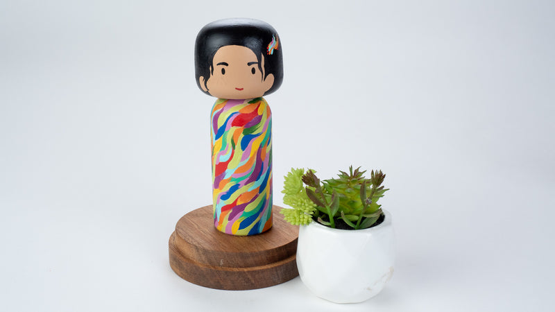 Hand-painted Japanese wooden Kokeshi doll! This cute Japanese vibrant-coloured doll will warm your heart or your someone special.  All dolls are hand-painted with love. 