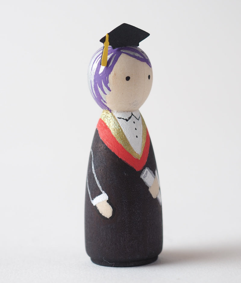 Graduation gift - Peg dolls. Give something unique and personalized.  Custom peg dolls of your family, friends, or colleagues!  They are hand-painted that show the uniqueness of each individual with their hobbies or occupations.  This will definitely touch the heart and bring smiles.  These are great for birthdays, anniversary, parent's gifts, grandparent’s gifts, retirement, graduations, communion, colleague’s going away gift, or any other occasions.