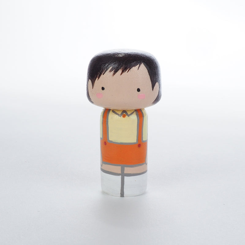 Give something unique and personalized.  Custom peg dolls of your family!  They are hand-painted that show the uniqueness of each individual in your family.  This will definitely touch the heart and bring smiles, may be even happy tears to your family. 