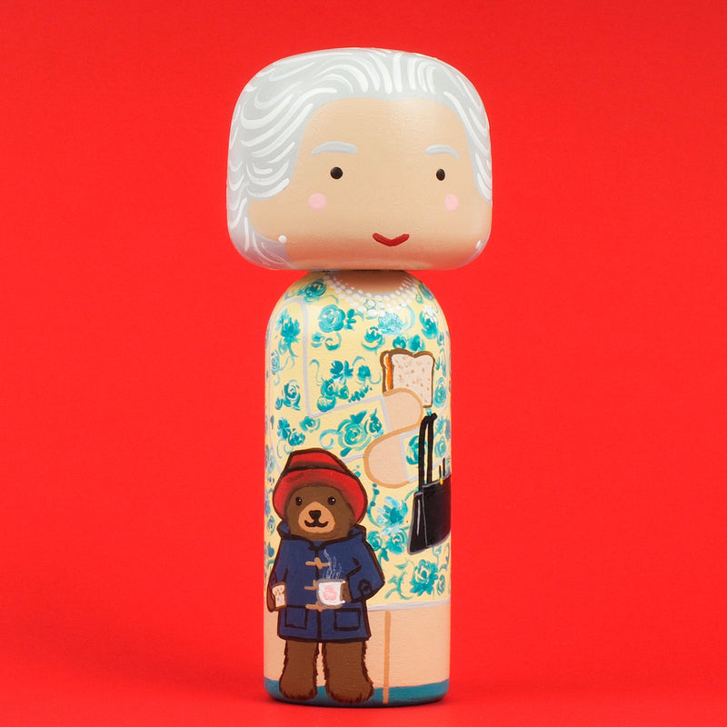 Queen Elizabeth Kokeshi peg doll.  Hand painted.