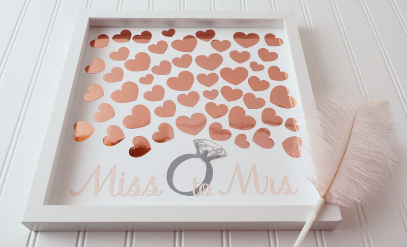 Throwing a bridal shower?  Have your guests sign a rose gold heart and preserve the beautiful memories for many years to come.  This 12"x12" Bridal shower guest book alternative consist of up to 50 hearts.  Other sizes are also available. 