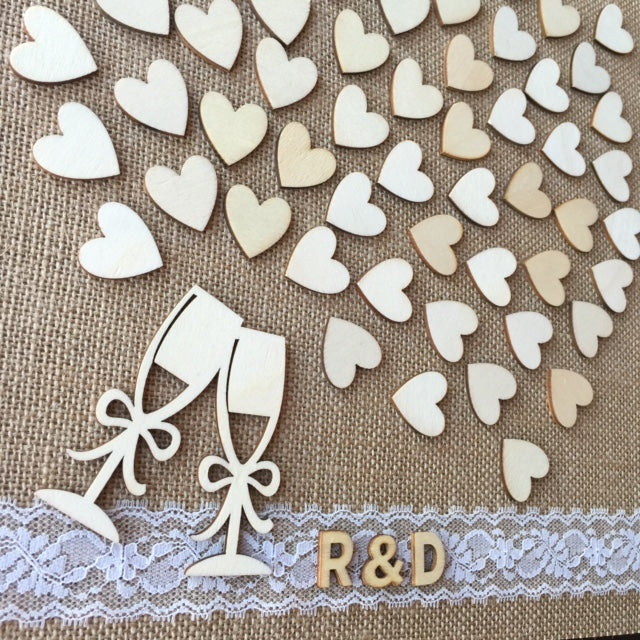 Burlap and Lace Wedding Guest Book Alternative! Have your guests sign a wooden heart and hang this guestbook after the wedding to preserve beautiful memories of your special day for many years to come.