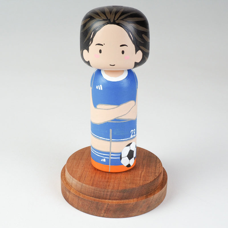 Introducing our new family portrait Kokeshi dolls!  Give something unique and personalized.  Customize your family, friends, or colleagues on Kokeshi dolls!  They are hand-painted with love that show the uniqueness of each individual such as specific sports or hobby.  Here is a family member who loves soccer but we can customize any sports. 